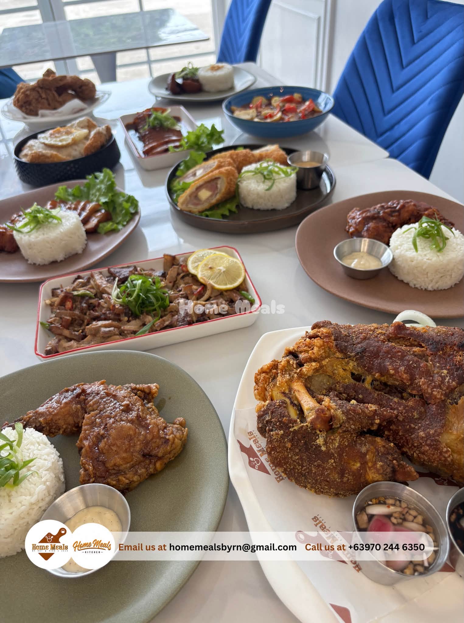 Cordon bleu rolls, fried chicken, and rice plates across a shared dining table