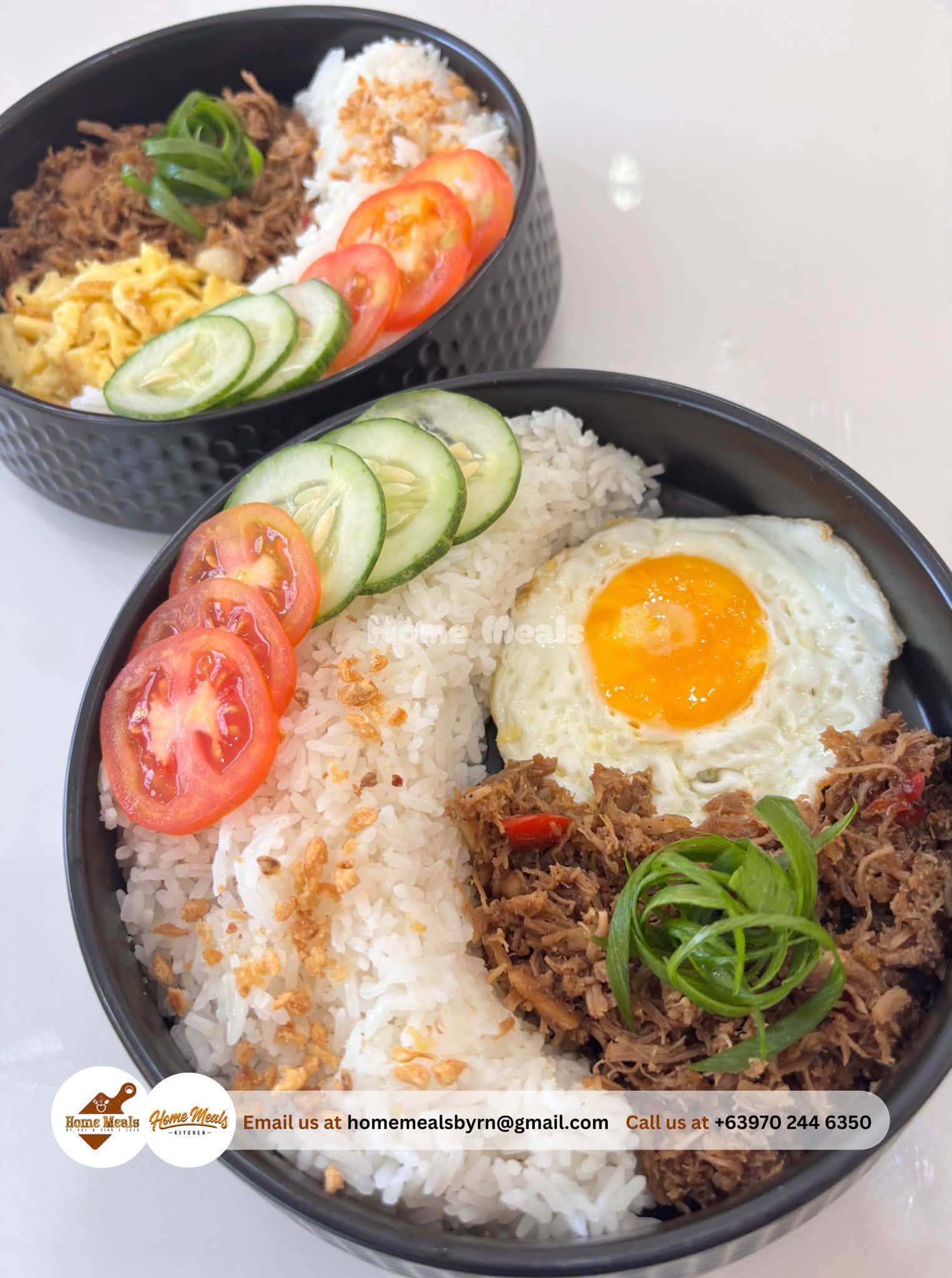 Special Adobo Flakes rice bowl with sunny-side up egg, tomato, and cucumber