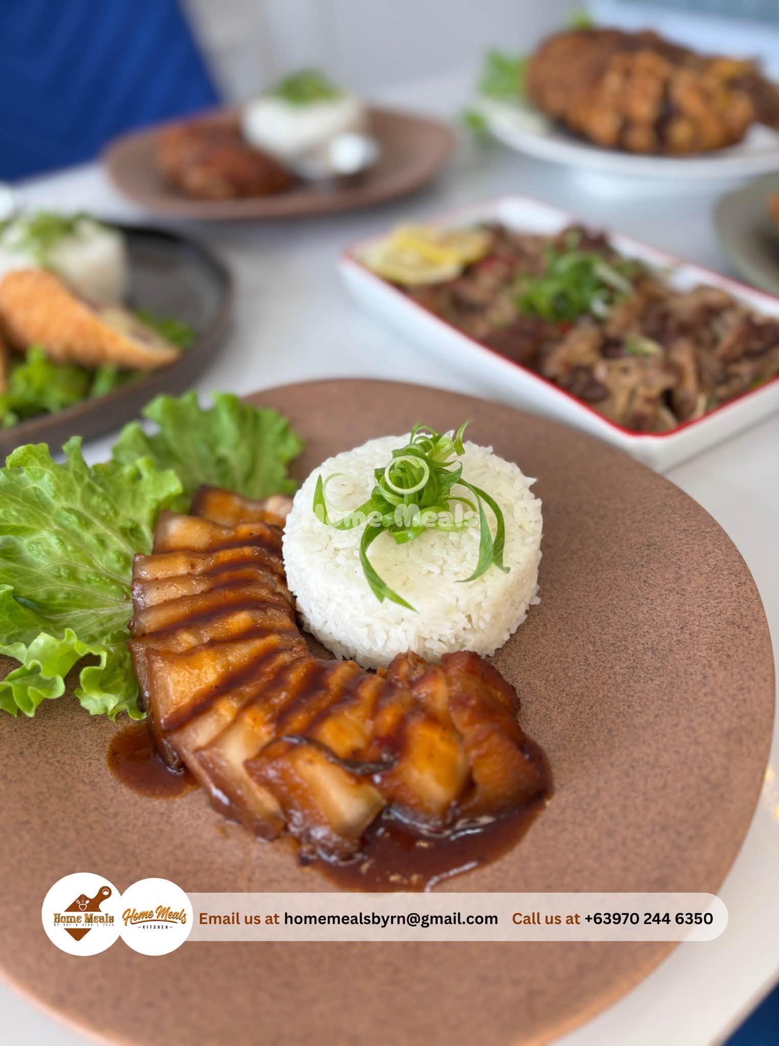 Pork Asado glazed in sweet savory sauce, plated with steamed rice
